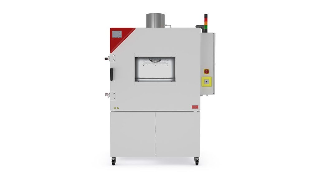 Es handelt sich um ein industrielles Gerät, vermutlich eine Maschine, vor einem weißen Hintergrund.